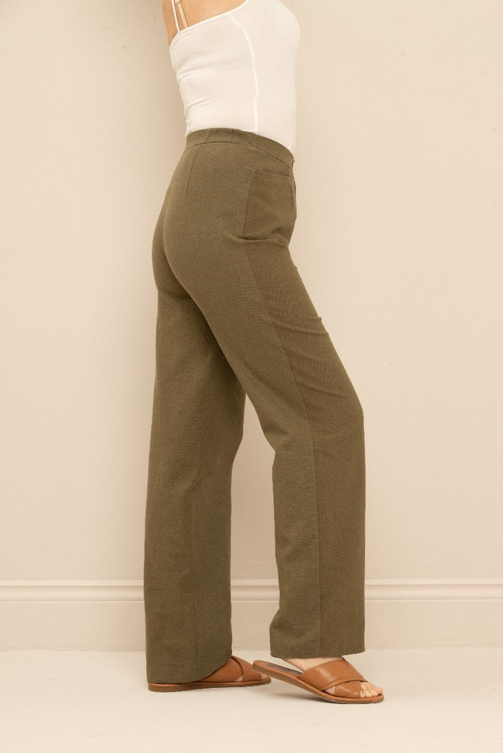 Lily Ella Collection olive wide-leg trousers for women, stylish and comfortable fit with white top and tan sandals, perfect for a casual chic look.