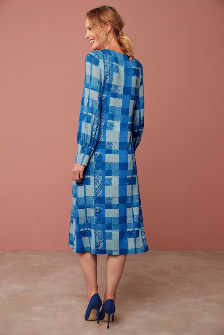 Lily Ella Collection blue patchwork-style midi dress with lace detail and elegant blue high heels, fashionable women's wear for spring season