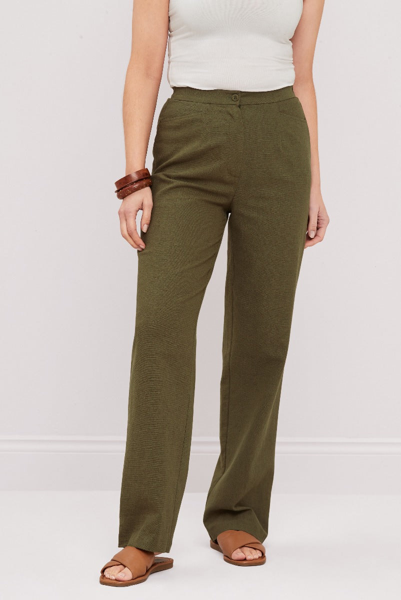 Lily Ella Collection olive green wide-leg trousers for women, stylish casual wear, high-waisted pants with earth-toned sandals.