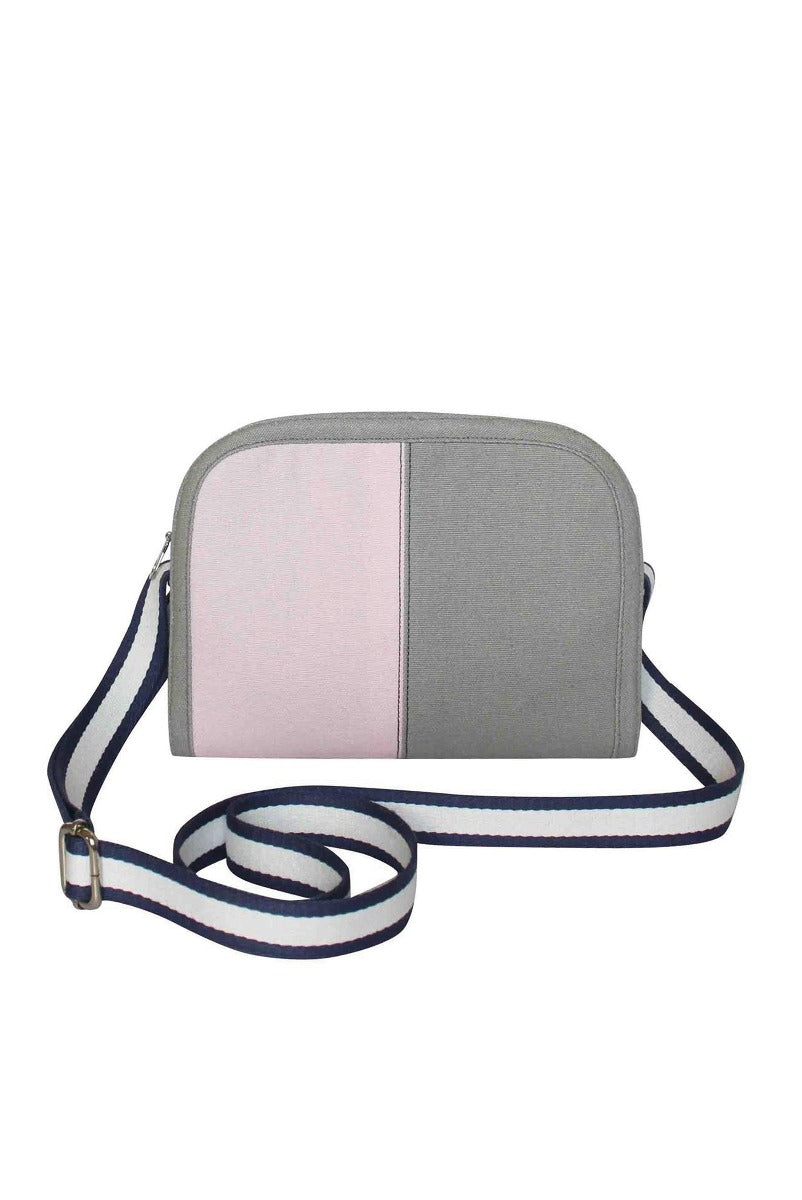 Lily Ella Collection two-tone crossbody bag in grey and pink with adjustable striped navy and white shoulder strap.
