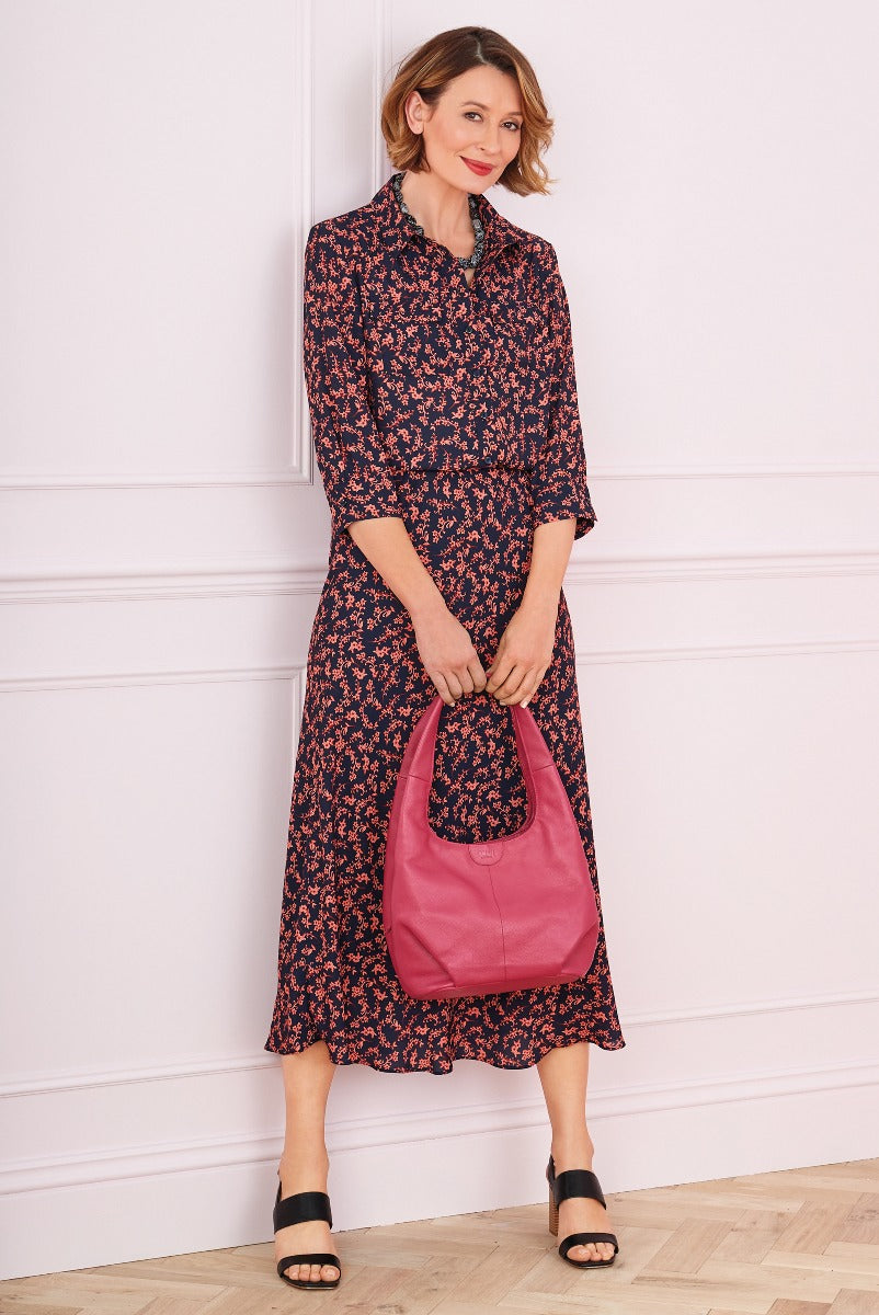 Lily Ella Collection elegant navy floral midi shirt dress paired with pink leather tote bag and black sandals for stylish women.