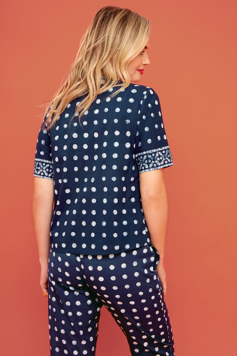 Lily Ella Collection navy polka dot loungewear set featuring a patterned short sleeve top and matching trousers, stylish comfortable women's clothing