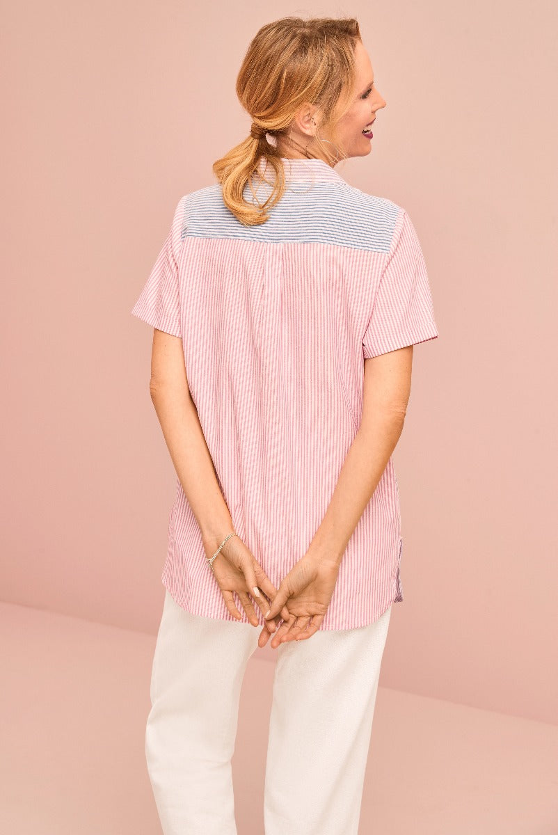 Lily Ella Collection pink striped blouse with contrasting blue collar and white trousers for women, elegant casual wear, back view