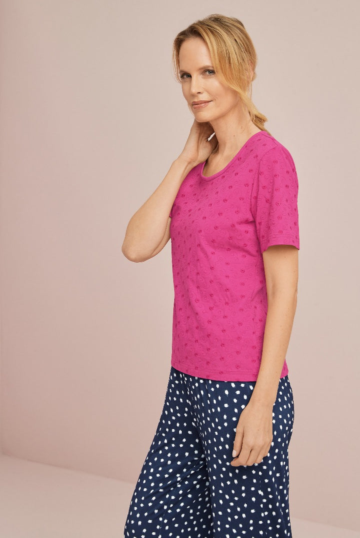 Lily Ella Collection fuchsia broderie patterned short sleeve top and navy polka dot trousers, elegant women's fashion, chic casual summer outfit.