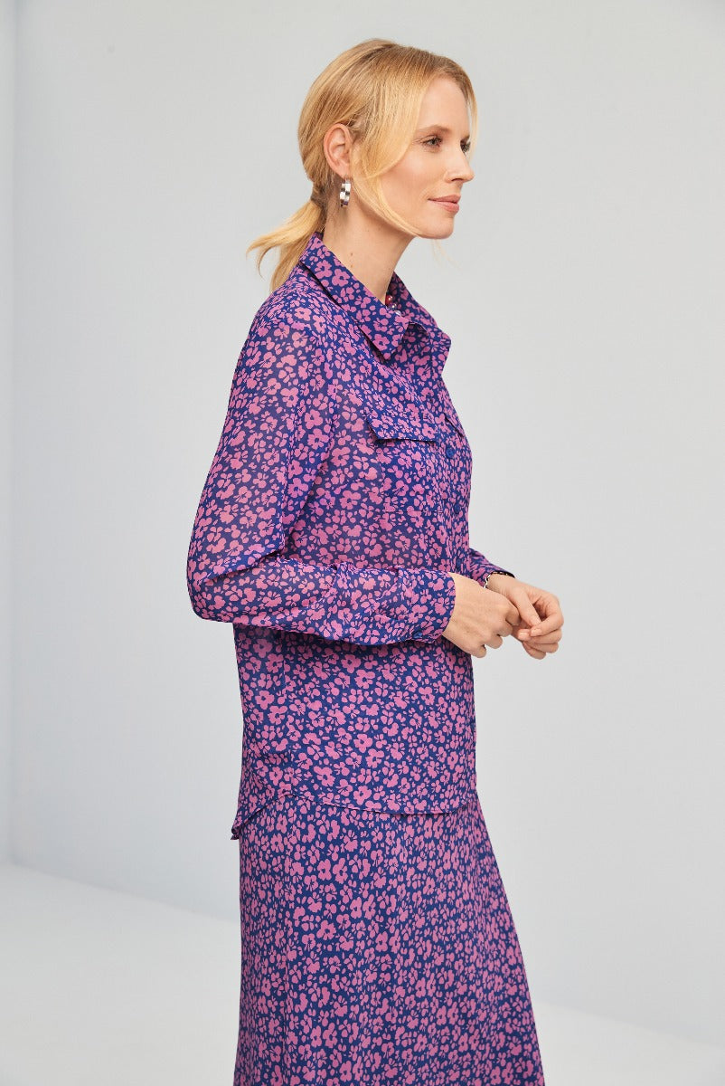 Lily Ella Collection purple floral print dress side view, elegant high-neck style with frill detail, stylish women's fashion for modern chic look.