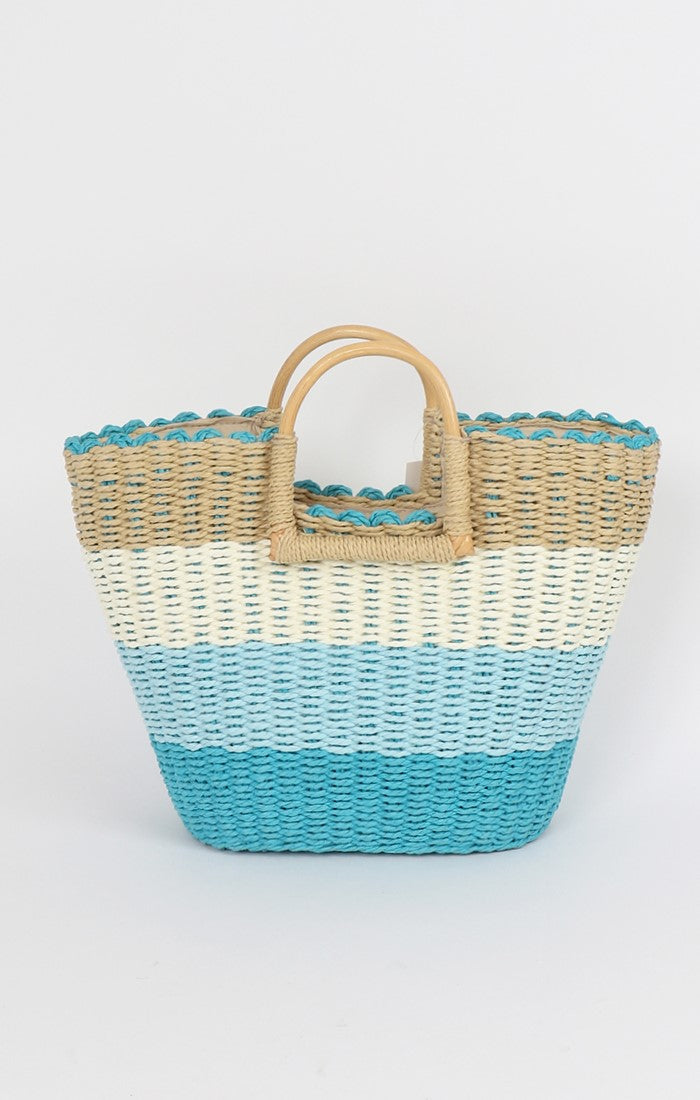 Lily Ella Collection blue and natural ombré woven beach bag with bamboo handles, stylish summer accessory.