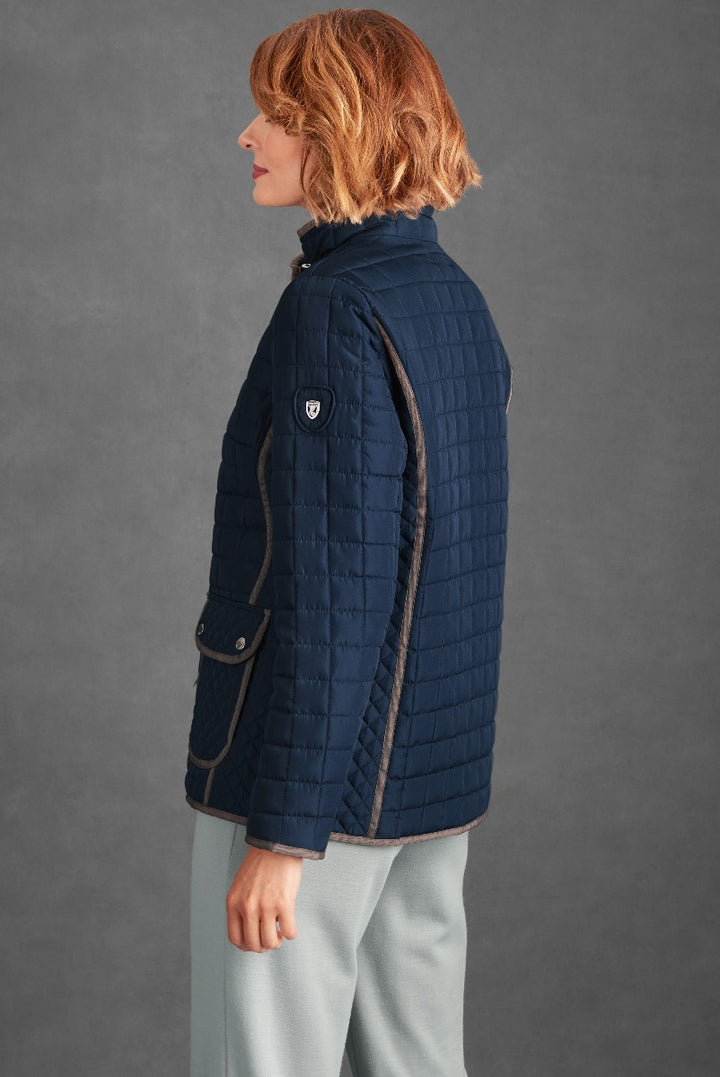 Lily Ella Collection women's navy quilted jacket with contrast trim, detailed stitching, and brand logo patch, stylish outerwear for modern fashion.