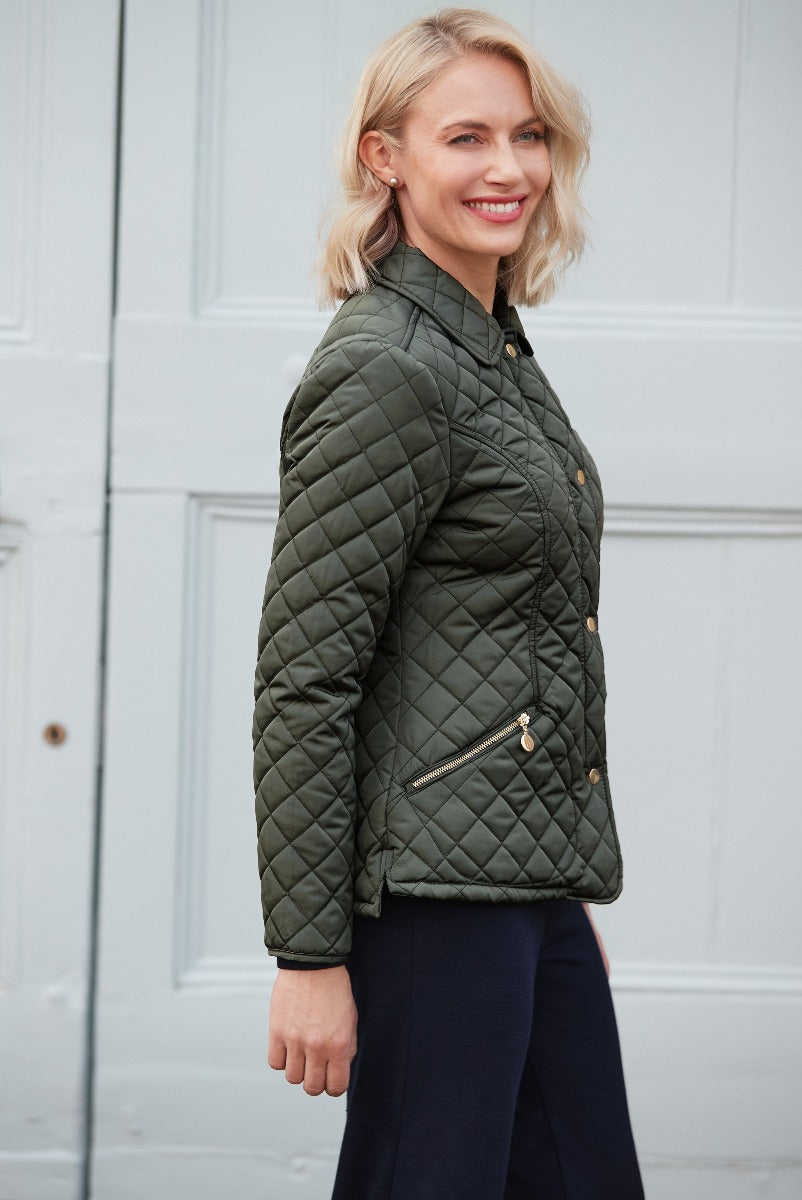Lily Ella Collection women's olive green quilted jacket with gold accents and zipper details, fashionable outerwear for casual style