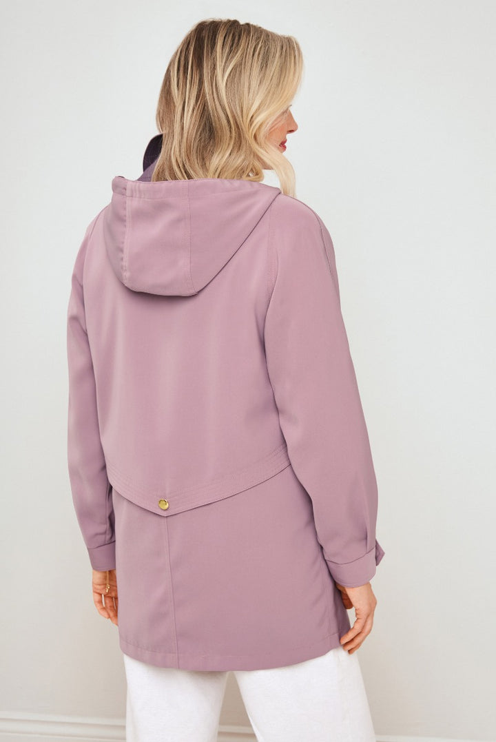 Lily Ella Collection mauve casual jacket, rear view of woman wearing stylish long-sleeve coat with hood and button detail, paired with white pants.