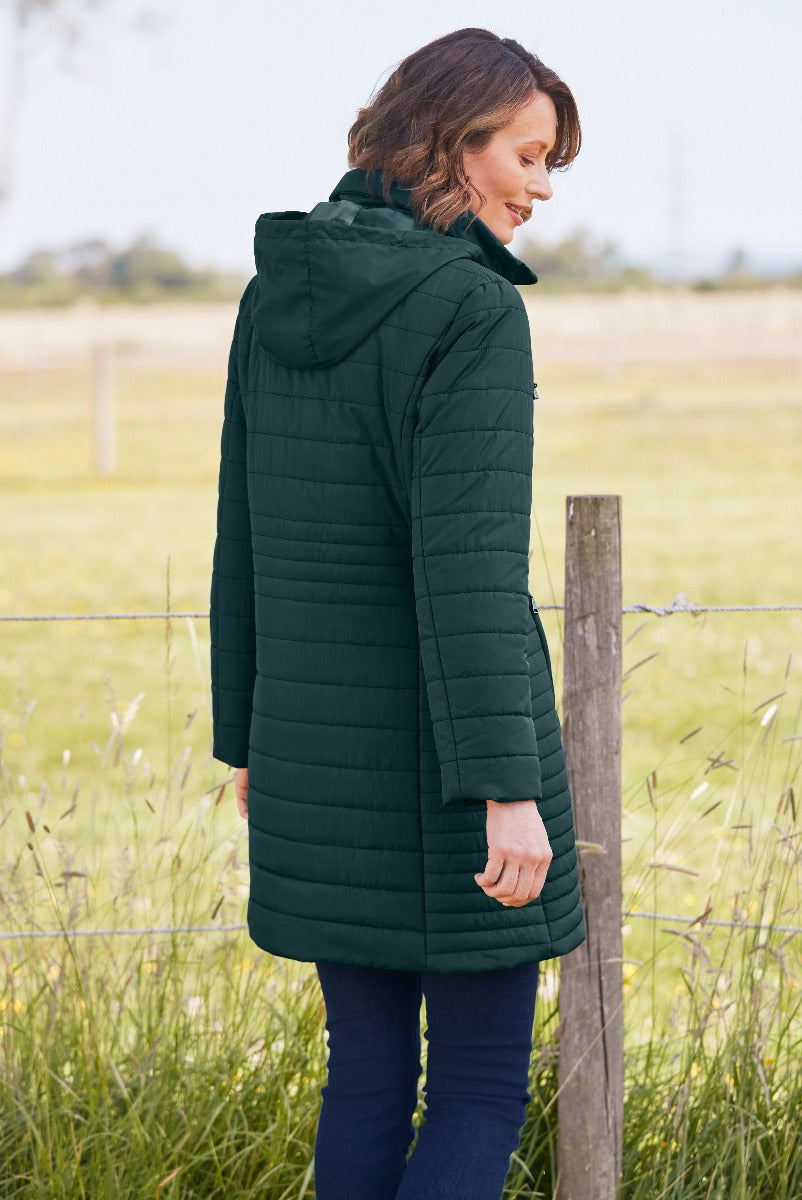 Lily Ella Collection stylish forest green quilted coat, long-sleeve winter jacket for women, outdoor country lifestyle clothing, elegant casual outerwear.