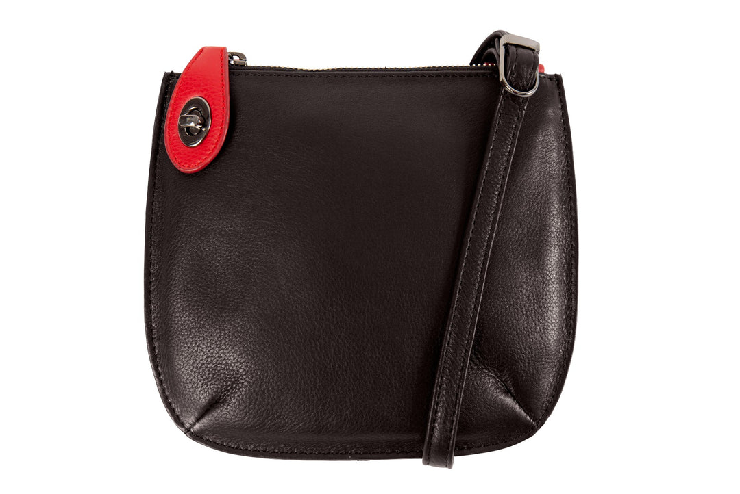 Lily Ella Collection black leather crossbody bag with red accent and stylish twist-lock closure