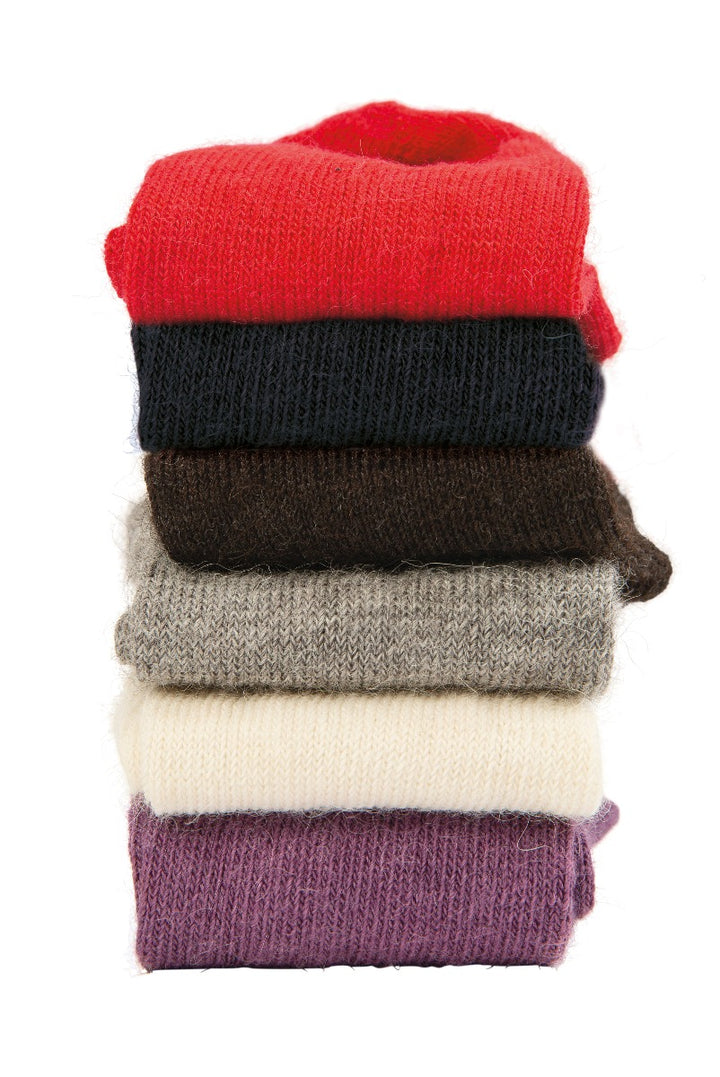 Lily Ella Collection stack of colorful knitted sweaters, featuring a vibrant red, classic navy, rich brown, heather grey, beige, and plum, comfortable and stylish women's winter clothing.
