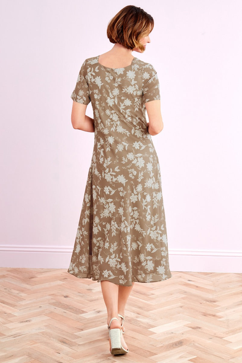 Lily Ella Collection taupe floral midi dress with short sleeves, elegant A-line cut, and vintage-inspired style for women, paired with beige heels.