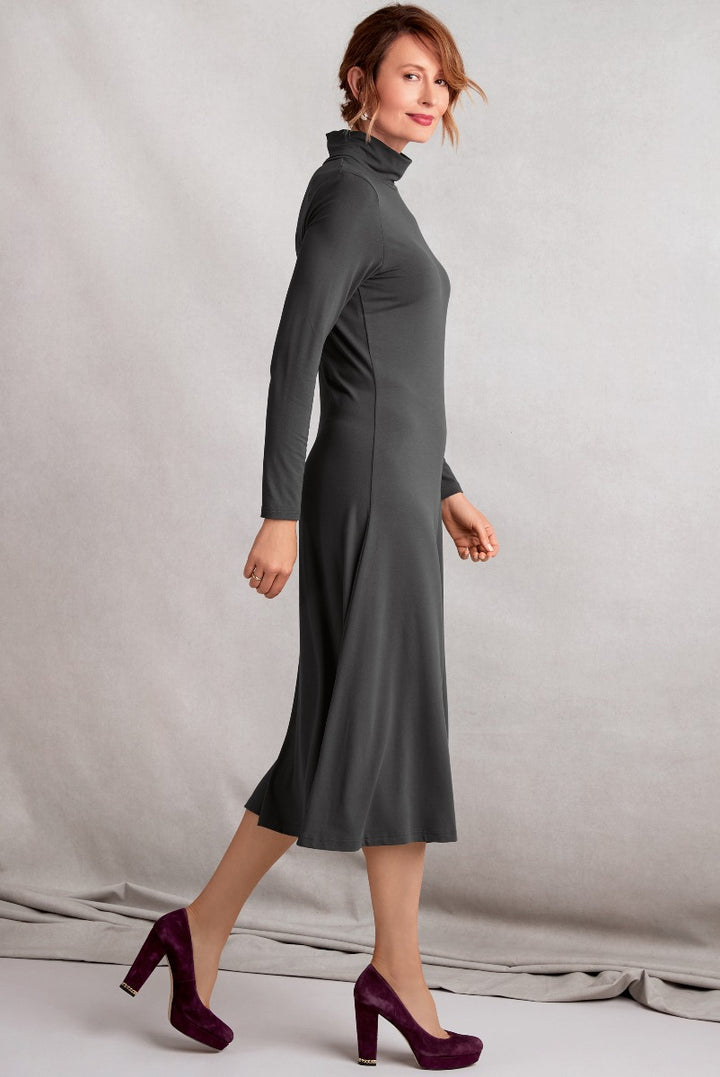 Lily Ella Collection charcoal grey figure-flattering midi dress with turtleneck paired with elegant burgundy heels, casual yet sophisticated women's fashion.