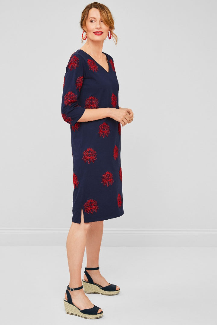 Lily Ella Collection navy blue dress with red floral print, three-quarter sleeve, V-neck style, paired with black wedge espadrilles, for a stylish women's spring outfit.