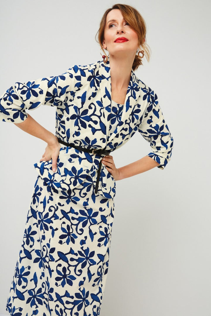 Lily Ella Collection elegant blue and white floral patterned wrap dress with three-quarter sleeves and chic waist belt, stylish summer outfit for women.