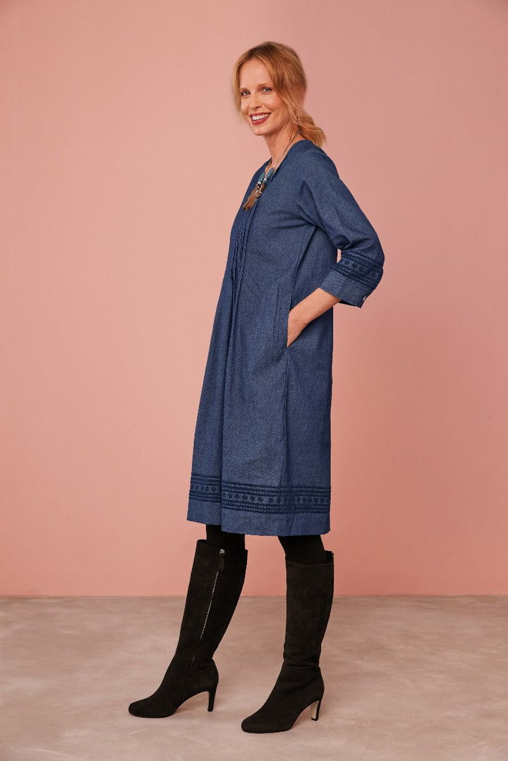 Lily Ella Collection denim tunic dress in blue with black knee-high boots for women, elegant casual outfit, stylish embroidered detailing.