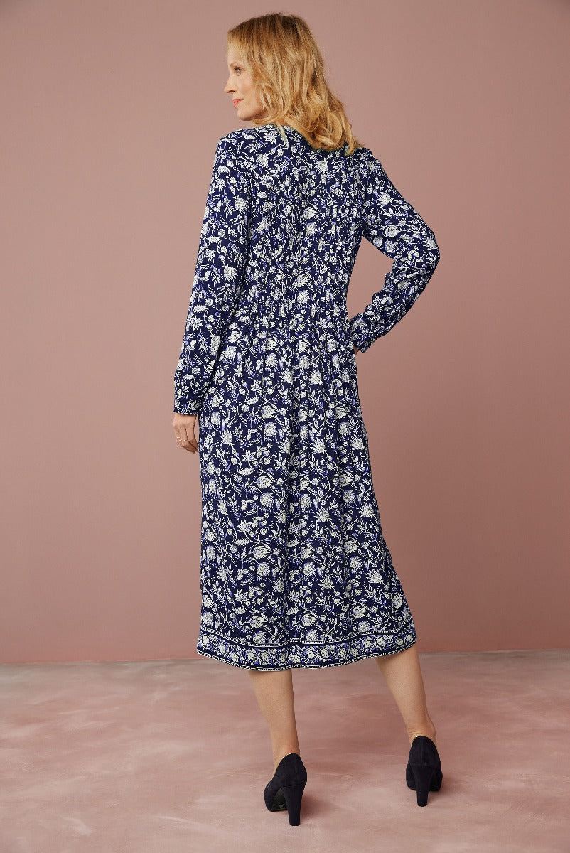 Lily Ella Collection navy blue floral print midi dress with long sleeves and black heels, elegant style for women's fashion.