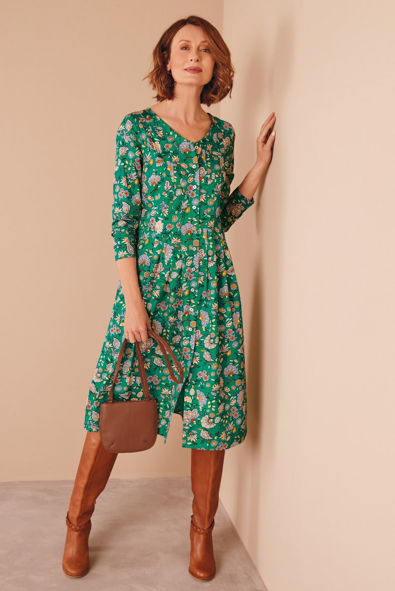 Lily Ella Collection green floral midi dress with brown leather boots and matching handbag for stylish women's fashion.