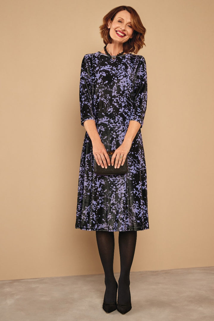 Lily Ella Collection elegant navy blue and purple floral print midi dress with three-quarter sleeves, round neckline, and matching clutch, perfect for sophisticated autumn style.
