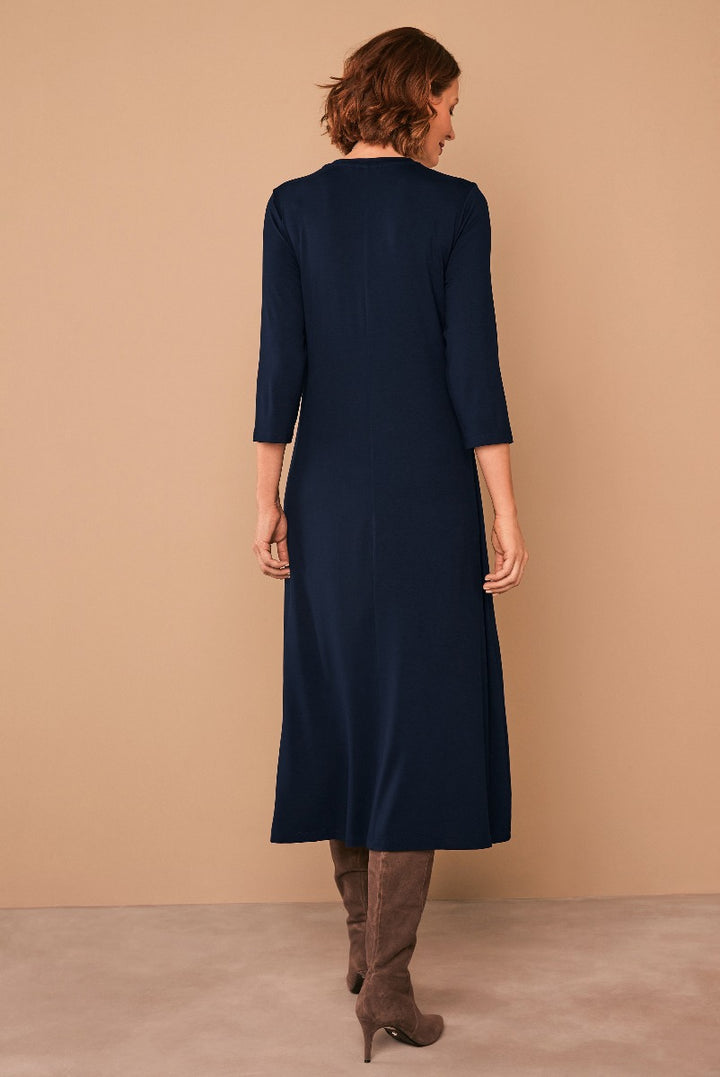 Lily Ella Collection elegant navy blue midi dress with three-quarter sleeves and brown heeled boots for women