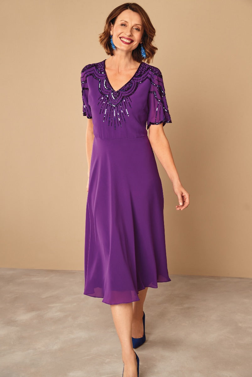 Lily Ella Collection purple midi dress with embellished neckline and flutter sleeves, stylish women's formal wear