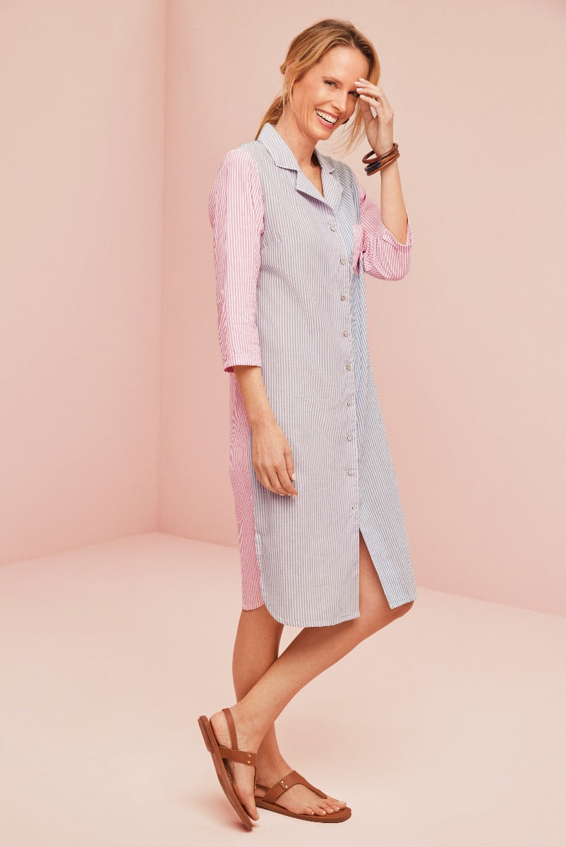 Lily Ella Collection striped shirt dress in pink and white, elegant mid-length women's fashion, casual chic summer dress with button-down front and collar, paired with brown sandals.