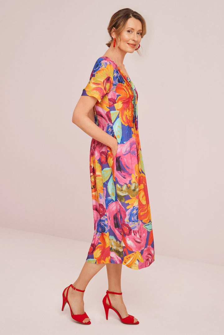 Lily Ella Collection vibrant floral print midi dress with red strappy heels, stylish and colorful summer outfit for women.