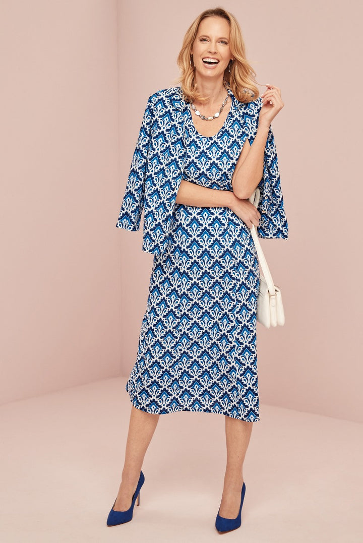 Lily Ella Collection elegant blue and white patterned midi dress with matching heels, stylish women's spring fashion, model showcasing latest design