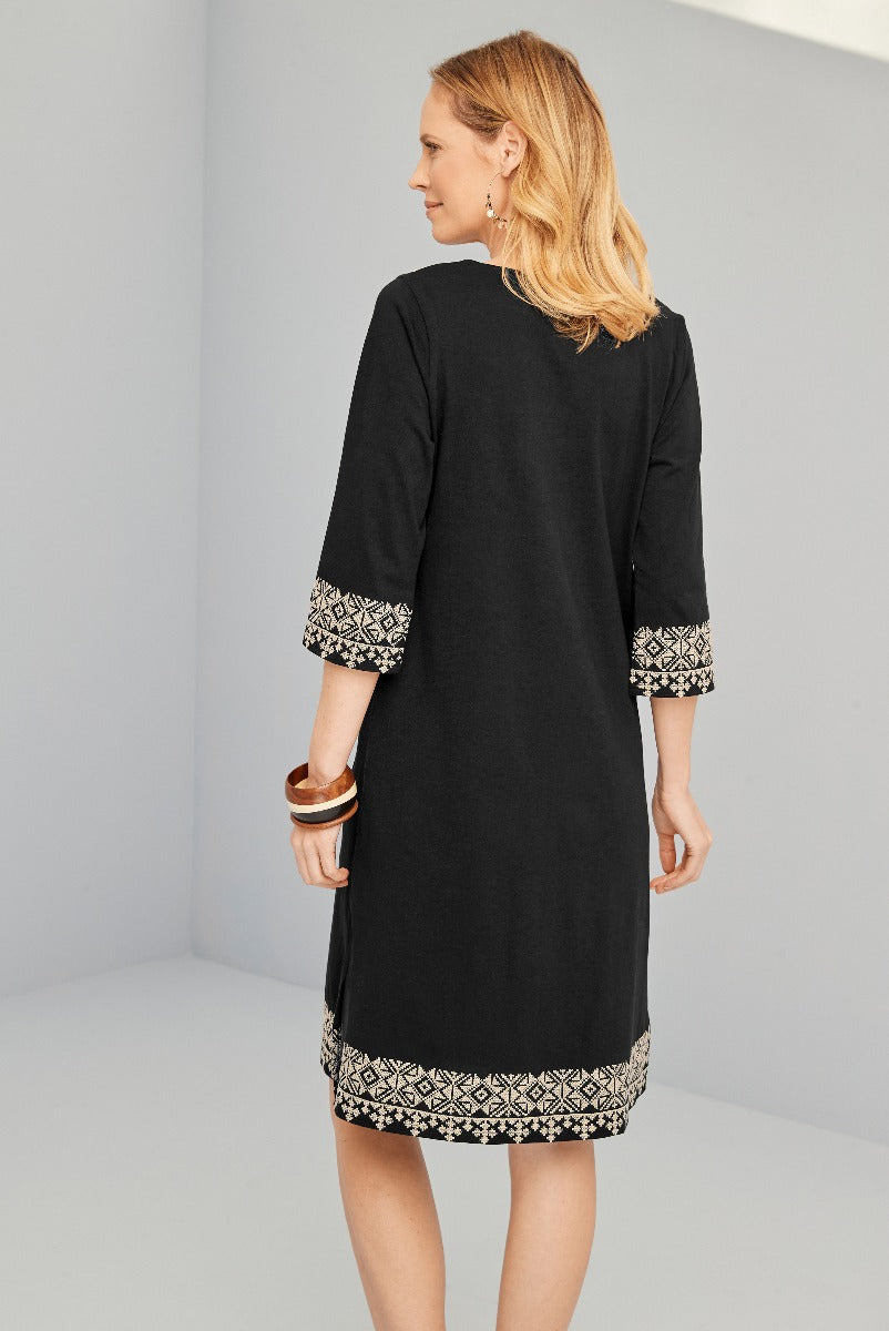 Lily Ella Collection elegant black tunic dress with patterned trim detailing, three-quarter sleeves, stylish women's fashion, comfortable casual wear.