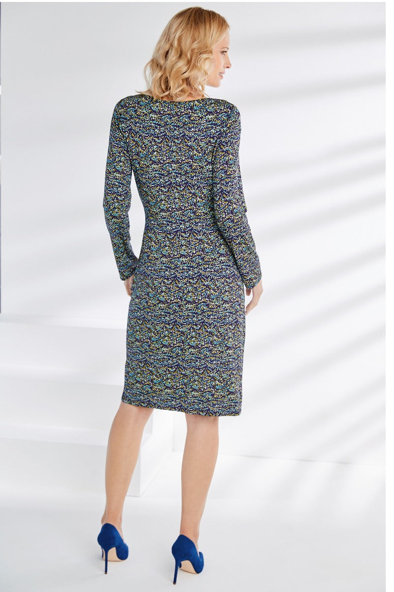 Lily Ella Collection elegant long sleeve printed dress in blue and yellow tones paired with royal blue heels, showcasing stylish women's fashion and sophisticated design.