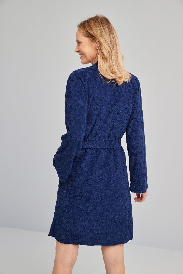 Lily Ella Collection navy blue lace dress with three-quarter sleeves and a belted waist, elegant knee-length fashion for women.