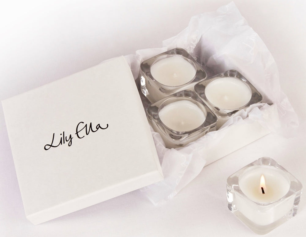 Lily Ella Collection elegant white candle gift set with lit tealight and stylish packaging
