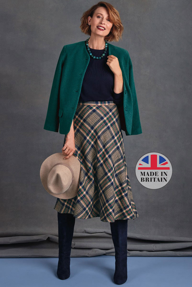 Lily Ella Collection stylish emerald green coat plaid skirt navy top women's fashion Made in Britain elegant look with accessories and navy boots