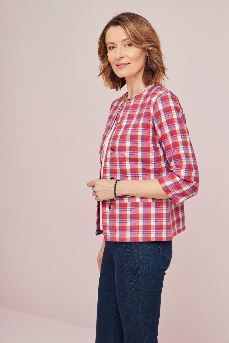 Lily Ella Collection pink and blue plaid jacket on model paired with denim jeans, stylish women's casual wear