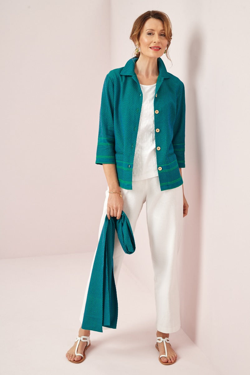 Lily Ella Collection emerald green textured jacket, white blouse, and cream trousers, elegant women's fashion, stylish outfit ideas, spring collection