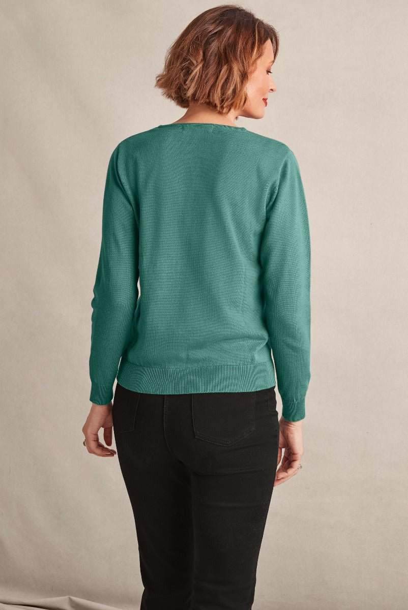 Lily Ella Collection emerald green knit sweater, casual chic style, comfortable fit, ribbed hem, women's fashion, rear view with model showcasing design detailing and fit.