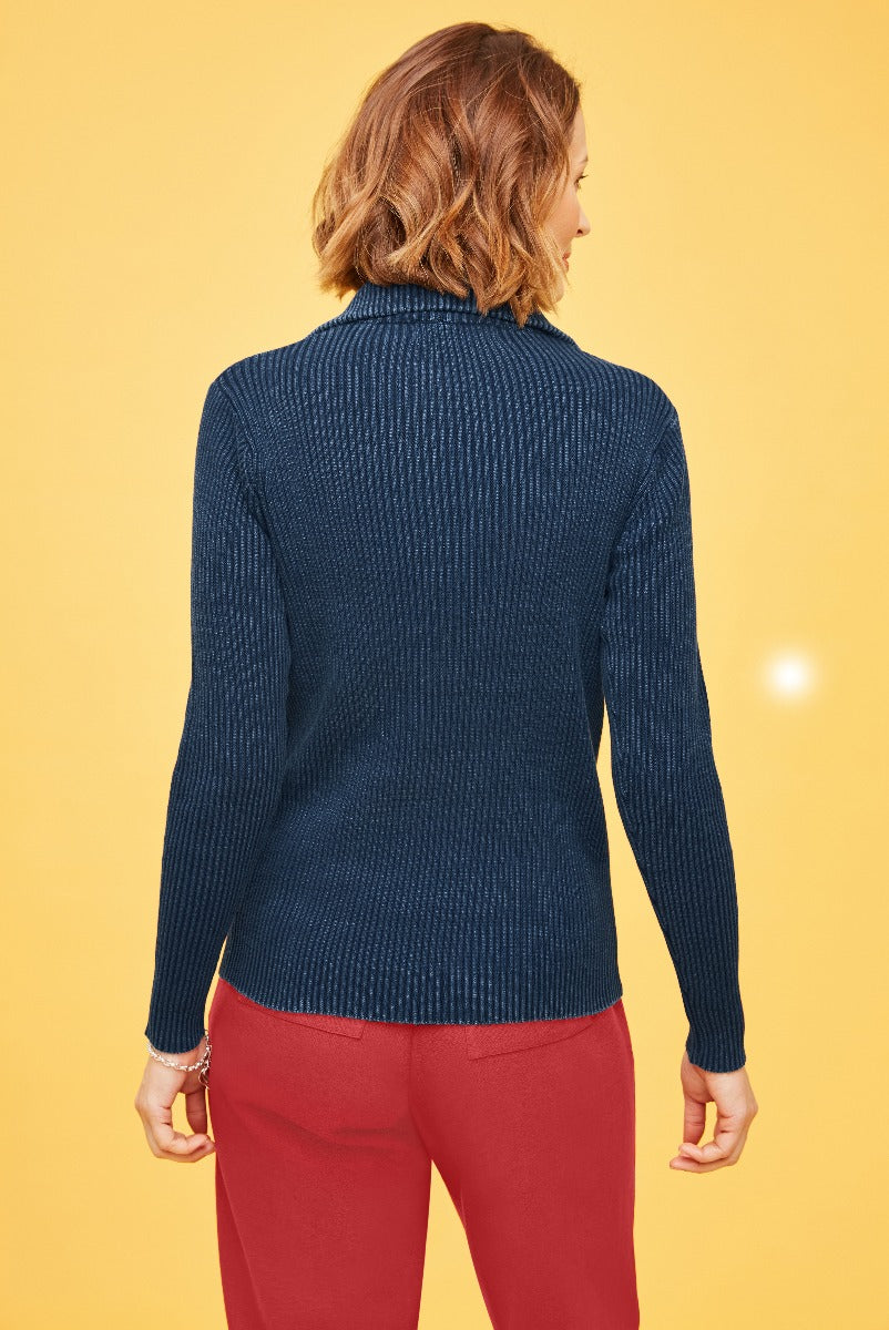 Lily Ella Collection navy blue knit sweater, classic ribbed style, paired with red trousers, autumn fashion, stylish knitwear for women.