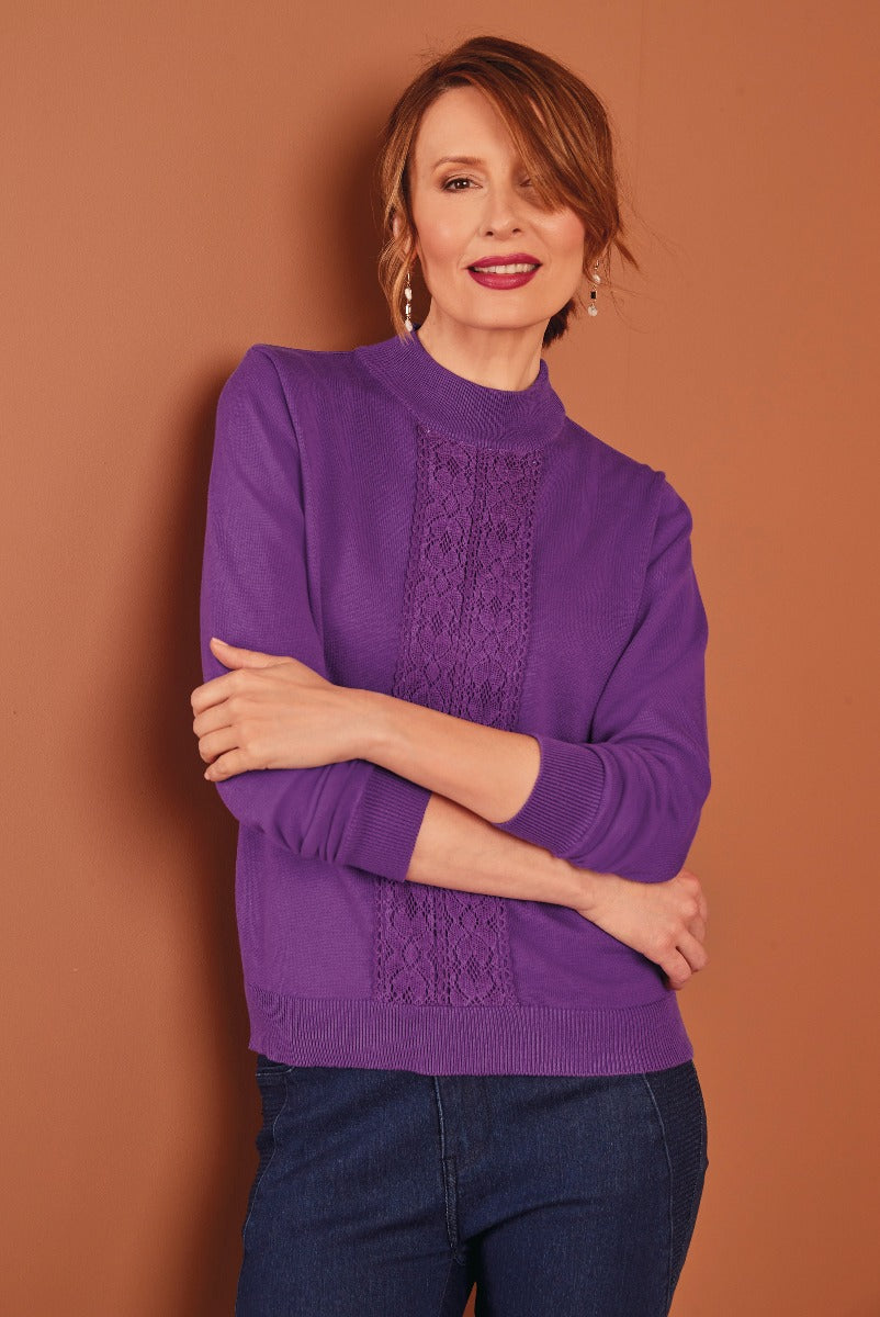 Lily Ella Collection purple cable knit jumper, stylish women's winter clothing, elegant high-neck sweater, comfortable casual wear, fashion model presenting trendy top, warm knitwear for ladies.