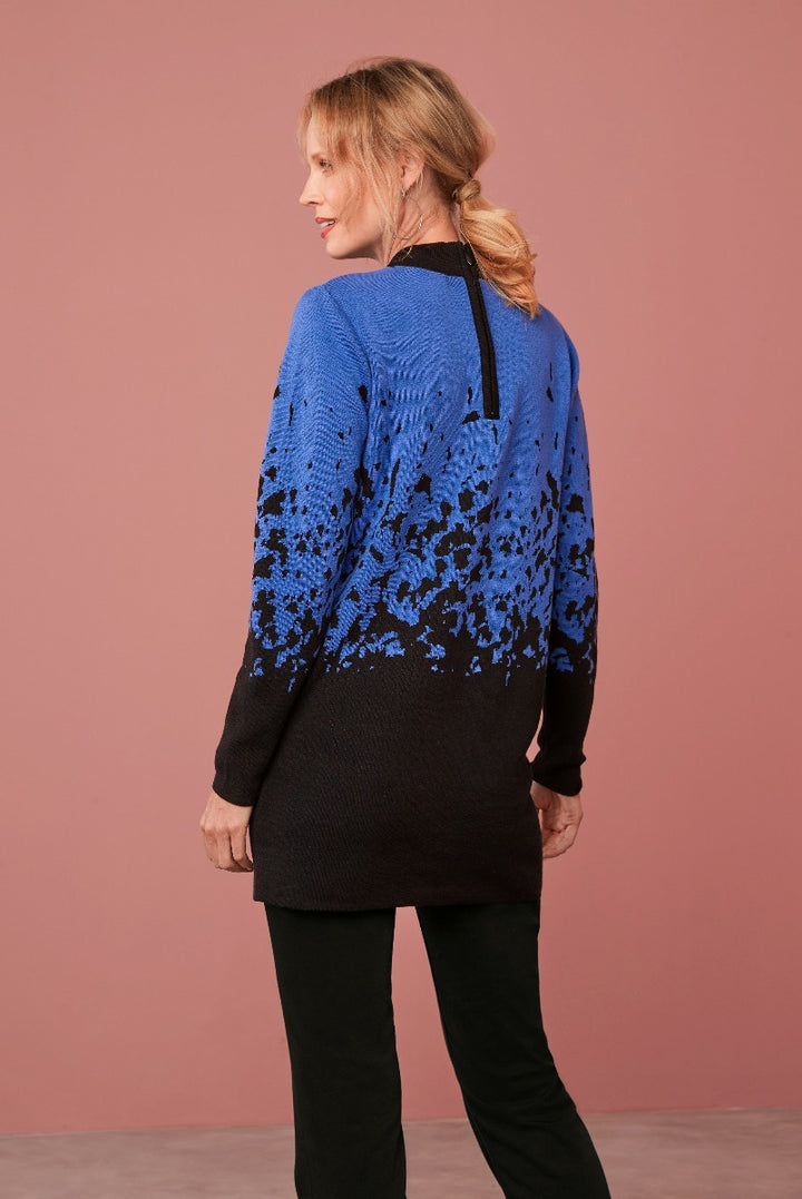 Lily Ella Collection blue and black ombre knit jumper, stylish women's casual wear, back view against pink background