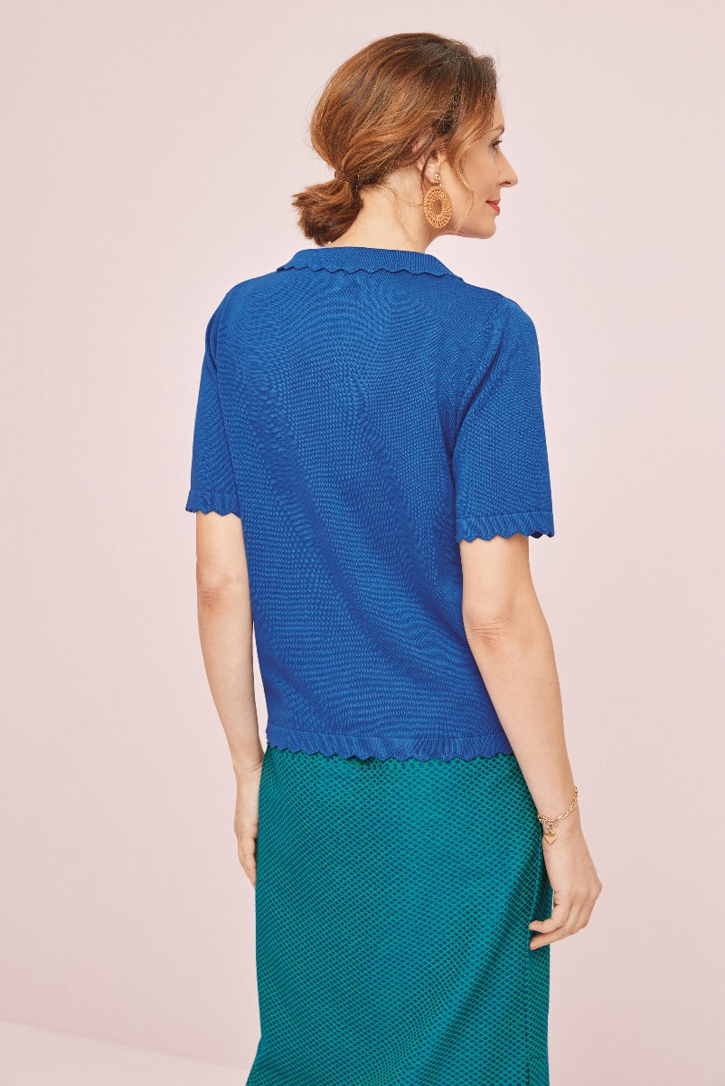 Lily Ella Collection elegant royal blue knit top with scalloped hem and green textured skirt, stylish women's wear, spring clothing collection