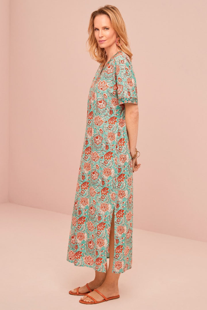 Lily Ella Collection teal floral maxi dress with side slit and short sleeves, fashionable women's summer apparel, elegant lady posing in stylish printed dress with coral patterns and matching accessories.