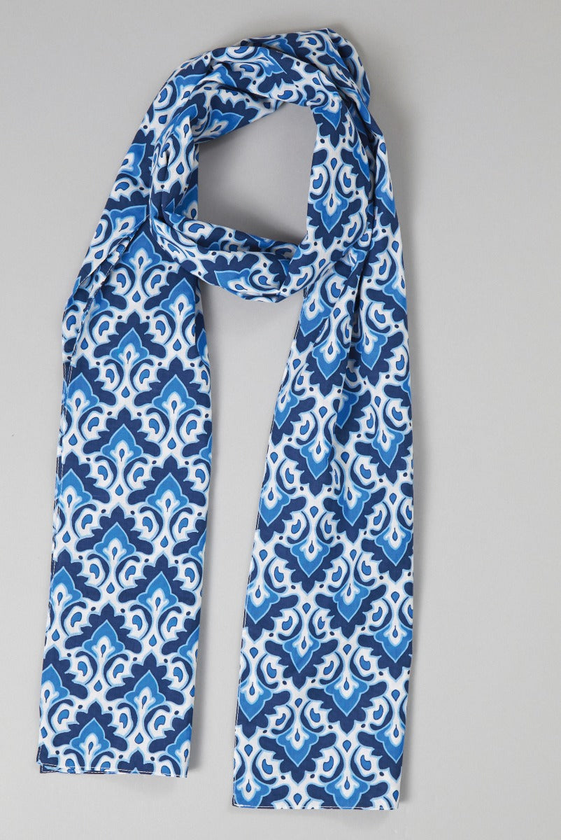 Lily Ella Collection blue and white patterned scarf, stylish women's accessory, intricate design, fashion scarf.
