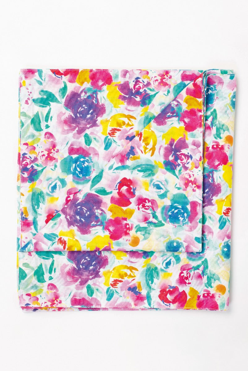 Lily Ella Collection vibrant multicolored floral print scarf, stylish women's accessory with pink, yellow, and blue blossoms on a lightweight fabric.