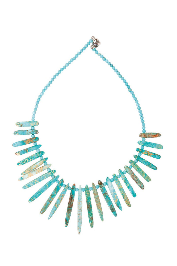 Lily Ella Collection turquoise beaded statement necklace with graduated spikes on white background