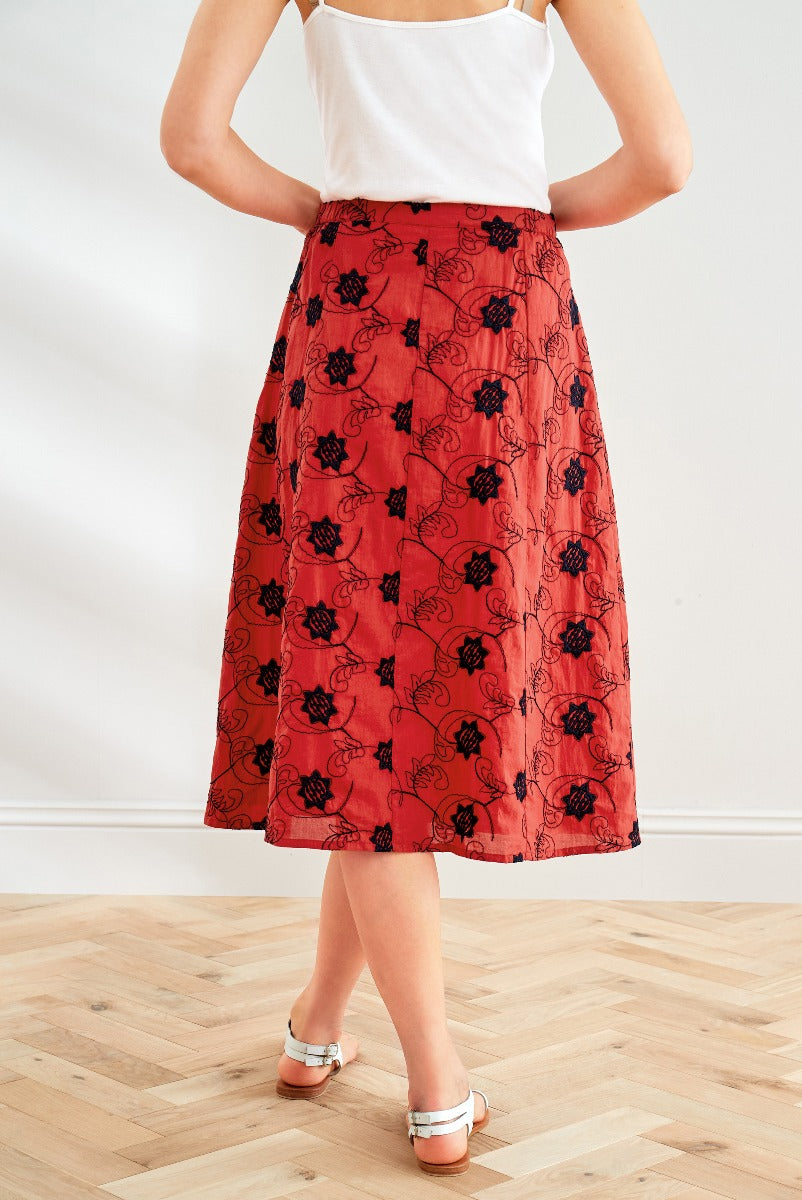 Lily Ella Collection red floral print midi skirt, elegant women's fashion, stylish spring-summer skirt outfit idea, versatile clothing piece for wardrobe.