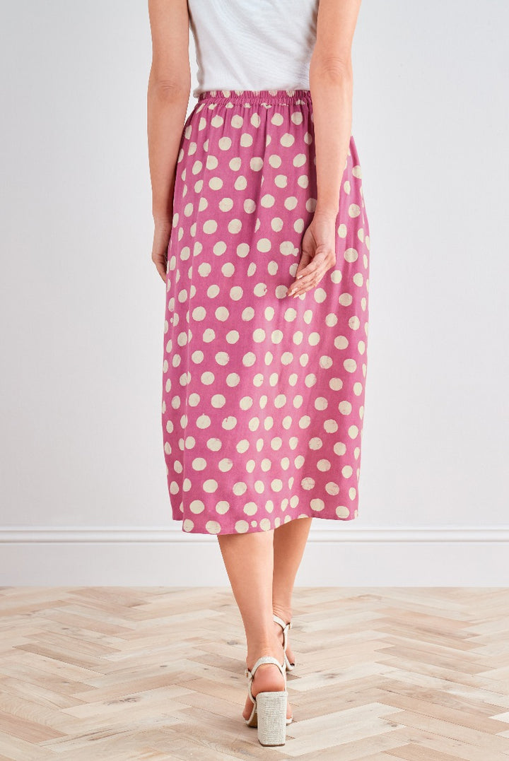 Lily Ella Collection stylish pink and cream polka dot midi skirt, fashionable women's apparel, casual summer skirt, versatile day-to-evening wear
