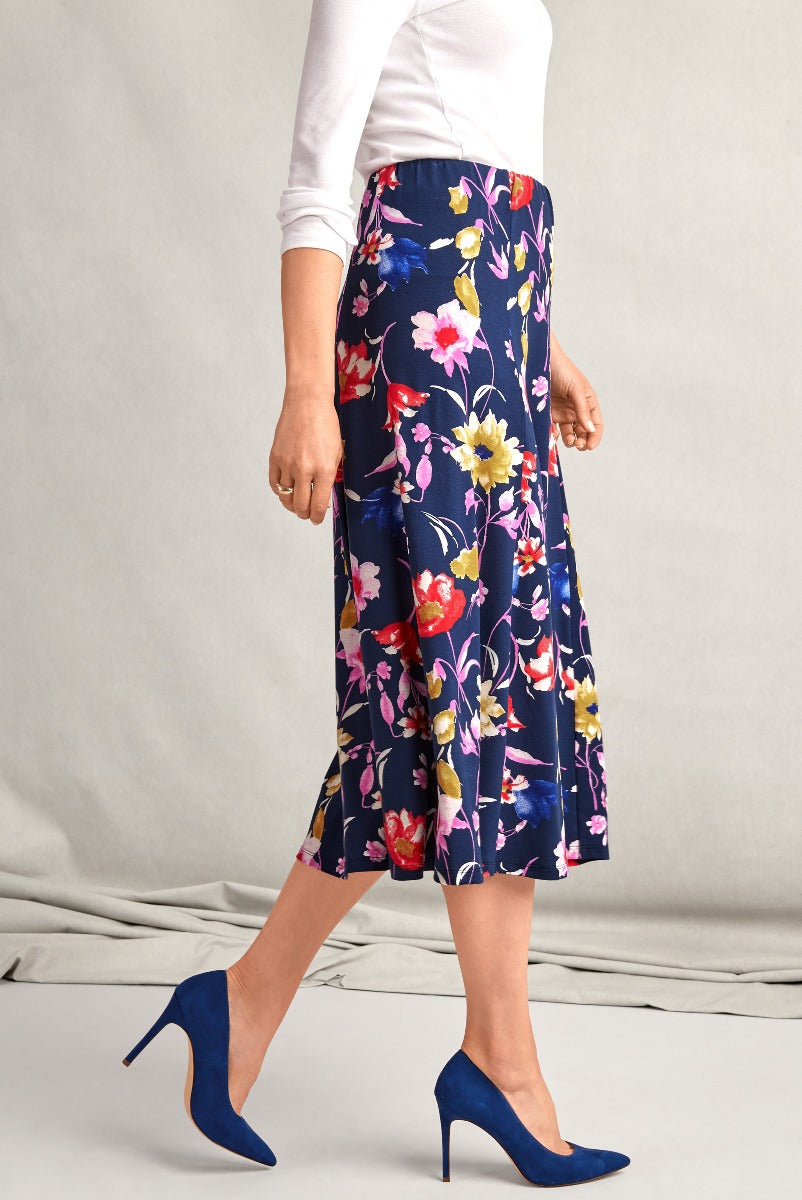 Lily Ella Collection Navy Floral Print Midi Skirt with Ruffle Detail paired with Cobalt Blue High Heels