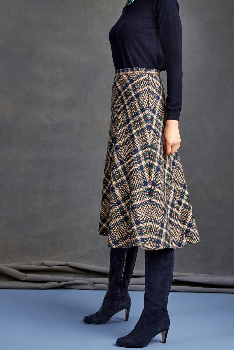 Lily Ella Collection elegant navy sweater with plaid A-line midi skirt and navy suede tall boots for women