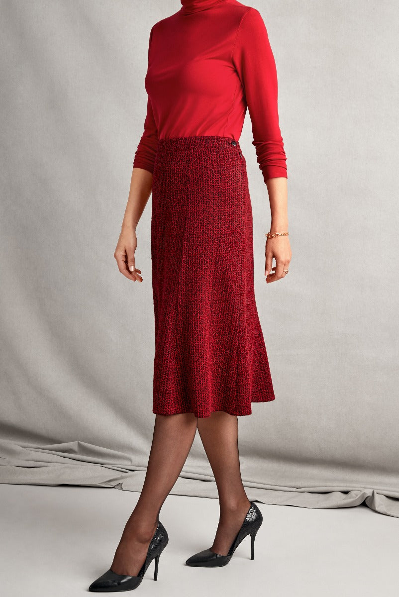 Lily Ella Collection elegant red turtleneck top paired with textured red A-line midi skirt and classic black high heels, showcasing sophisticated women's fashion and timeless style.